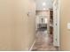 Hallway with tiled floors leading to a living area and office space at 15015 E Vermillion Dr, Fountain Hills, AZ 85268