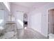 Bright bathroom featuring a double sink, granite countertops, and access to additional rooms at 1502 E Detroit St, Chandler, AZ 85225