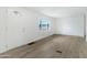 Inviting living room featuring new floors, fresh paint, and an abundance of natural light at 16215 N 35Th Pl, Phoenix, AZ 85032