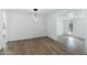 Open-concept living room with modern lighting and new flooring at 16215 N 35Th Pl, Phoenix, AZ 85032
