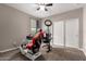 Versatile bedroom with a ceiling fan, closet, and neutral color, perfect for work at 17017 N Palo Azul Rd, Maricopa, AZ 85138