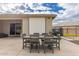Great patio with a movie screen, dining set and grill, perfect for entertaining at 17017 N Palo Azul Rd, Maricopa, AZ 85138