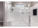 Clean shower with bright light and white features at 17017 N Palo Azul Rd, Maricopa, AZ 85138