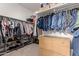 Spacious walk-in closet with ample shelving and hanging space, perfect for organization at 17017 N Palo Azul Rd, Maricopa, AZ 85138