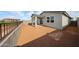 Backyard with a patio and view of the property's rear exterior at 17266 W Daley Ln, Surprise, AZ 85387