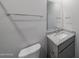 Granite bathroom vanity and toilet at 17266 W Daley Ln, Surprise, AZ 85387
