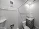 Bathroom with a shower and granite vanity at 17266 W Daley Ln, Surprise, AZ 85387