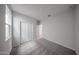 Bright bedroom with a closet at 17266 W Daley Ln, Surprise, AZ 85387