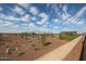 Well-maintained community park with a playground, tennis courts, a covered picnic area, and desert landscaping at 17266 W Daley Ln, Surprise, AZ 85387