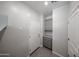 Mud room with storage cabinets and access to the garage at 17266 W Daley Ln, Surprise, AZ 85387