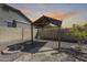 Backyard gazebo provides a shady retreat in a desert landscaped yard at 1785 S 222Nd Ln, Buckeye, AZ 85326
