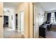 Bright hallway with neutral tones, connecting various rooms in the home at 1785 S 222Nd Ln, Buckeye, AZ 85326