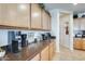 Charming kitchen view featuring a coffee bar, and ample natural light at 1785 S 222Nd Ln, Buckeye, AZ 85326