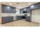 Kitchen featuring stainless steel appliances, subway tile backsplash, and ample cabinet space at 1816 W Villa Maria Dr, Phoenix, AZ 85023