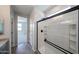 Modern bathroom with a glass-enclosed shower at 18243 W Daley Ln, Surprise, AZ 85387