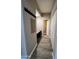 Hallway area featuring built-in desk and storage space at 19777 N 76Th St # 1198, Scottsdale, AZ 85255