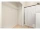 Bathroom area with shower and tiled flooring at 2025 N 106Th Dr, Avondale, AZ 85392