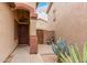 Inviting front entrance with desert plants, showcasing a warm welcome at 2025 N 106Th Dr, Avondale, AZ 85392