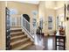 Grand foyer with high ceilings, staircase, and lots of natural light at 2280 E Aloe Pl, Chandler, AZ 85286