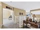 Spacious loft area with desk and views overlooking the living area at 2280 E Aloe Pl, Chandler, AZ 85286