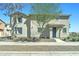 Charming two-story home featuring desert landscaping, neutral stucco, shutters, and a covered entryway, perfect for a Gathering at 2315 N 73Rd Dr, Phoenix, AZ 85035