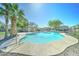 Community pool with mature shade trees, desert landscaping and a covered pool house at 2315 N 73Rd Dr, Phoenix, AZ 85035