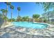 Sparkling community pool with desert landscaping and a covered pool house at 2315 N 73Rd Dr, Phoenix, AZ 85035