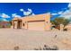 Single-story home with attached garage and xeriscape landscaping at 26015 S Grapefruit Dr, Queen Creek, AZ 85142