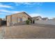 Backyard view with a patio and rock groundcover at 40335 W Novak Ln, Maricopa, AZ 85138