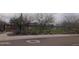 Scenic community park with playground, covered picnic area and natural landscaping creating a Gathering-friendly atmosphere at 4121 W Bradshaw Creek Ln, New River, AZ 85087