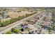 Community view with homes that have desert landscaping, pools, and green space at 41734 N Cielito Linda Way, San Tan Valley, AZ 85140