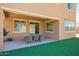 Back patio featuring outdoor seating and artificial grass at 41734 N Cielito Linda Way, San Tan Valley, AZ 85140