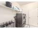Spacious laundry room featuring modern washer and dryer and storage at 41734 N Cielito Linda Way, San Tan Valley, AZ 85140
