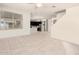 Open-concept living room featuring tile floors and views of the kitchen at 41734 N Cielito Linda Way, San Tan Valley, AZ 85140