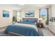 Comfortable main bedroom featuring a plush bed, serene decor, and dual windows at 41734 N Cielito Linda Way, San Tan Valley, AZ 85140