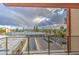 View from a balcony featuring a parking lot and city landscape at 4750 N Central Ave # 3B, Phoenix, AZ 85012