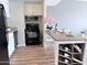 Bright kitchen featuring stainless steel appliances, white cabinetry, and a stylish kitchen island at 4750 N Central Ave # 3B, Phoenix, AZ 85012