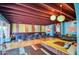 Comfortable lounge area with vibrant accents, unique lighting, and plush seating, perfect for relaxation and social gatherings at 4750 N Central Ave # 3B, Phoenix, AZ 85012