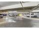 Well-lit parking garage with ample space for resident vehicles, ensuring convenient and secure parking at 4750 N Central Ave # 3B, Phoenix, AZ 85012