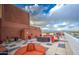 Spacious rooftop deck with stylish seating, offering stunning views of the surrounding mountains and cityscape at 4750 N Central Ave # 3B, Phoenix, AZ 85012