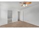 Bedroom features fresh paint and access to an en suite bathroom at 4831 N 93Rd Dr, Phoenix, AZ 85037
