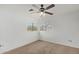 Bedroom featuring carpet, a ceiling fan, and natural light from windows at 4831 N 93Rd Dr, Phoenix, AZ 85037