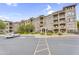 Apartment building featuring multiple stories, private balconies, and well-maintained landscaping at 5350 E Deer Valley Dr # 1419, Phoenix, AZ 85054