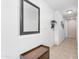 Hallway with a mirror, coat rack, bench with storage, neutral paint, and tile flooring at 5350 E Deer Valley Dr # 1419, Phoenix, AZ 85054