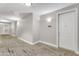 Elegant hallway with neutral walls, stylish flooring, and a glimpse of unit number 1419 at 5350 E Deer Valley Dr # 1419, Phoenix, AZ 85054