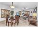Inviting living and dining area with tile floors, fireplace, and comfortable seating at 5350 E Deer Valley Dr # 1419, Phoenix, AZ 85054