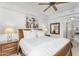 Serene main bedroom featuring a comfortable bed, ceiling fan, and natural light at 5350 E Deer Valley Dr # 1419, Phoenix, AZ 85054