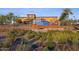 Landscaped signage for Desert Ridge Marketplace with green shrubbery and desert vegetation at 5350 E Deer Valley Dr # 1419, Phoenix, AZ 85054