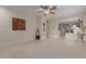 Bright and airy living room with tiled floors, perfect for entertaining guests at 606 S 124Th Ave, Avondale, AZ 85323