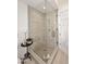 Glass enclosed shower featuring elegant tile work and modern fixtures at 6166 N Scottsdale Rd # C4004, Paradise Valley, AZ 85253